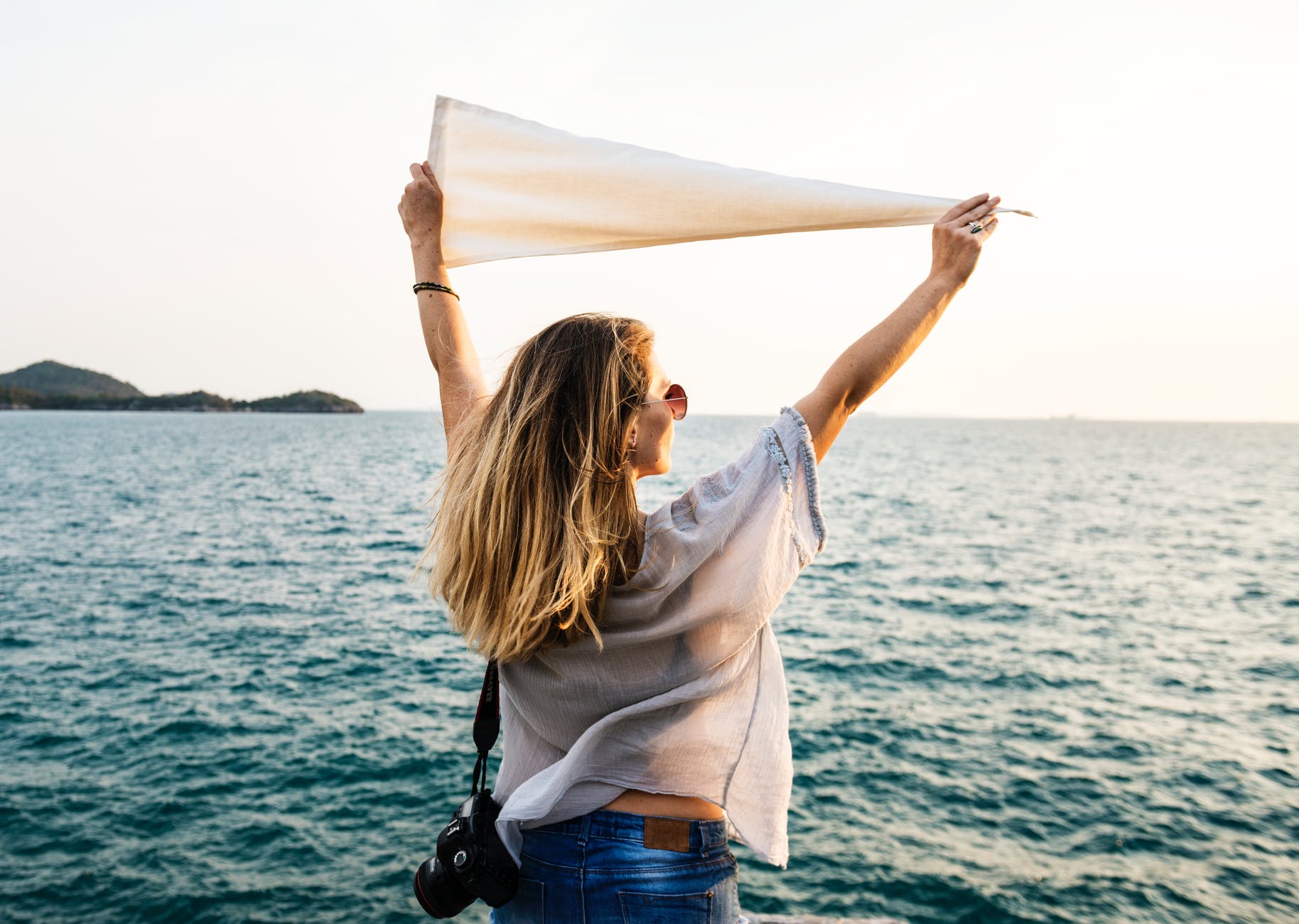 photo of woman wearing white top